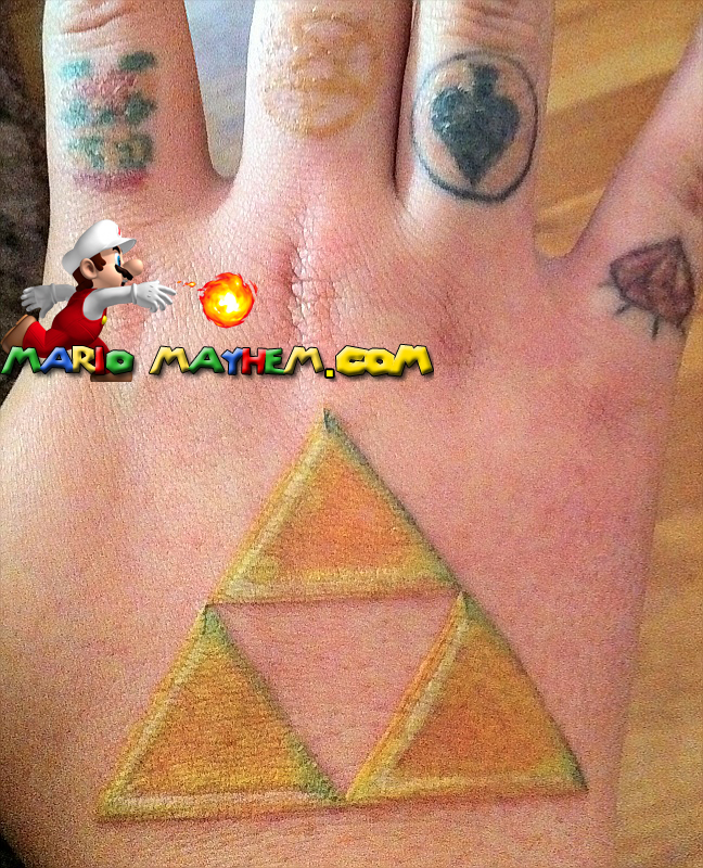Zelda triforce tattoo. KillaSkill has sent in a larger version of his Mario 