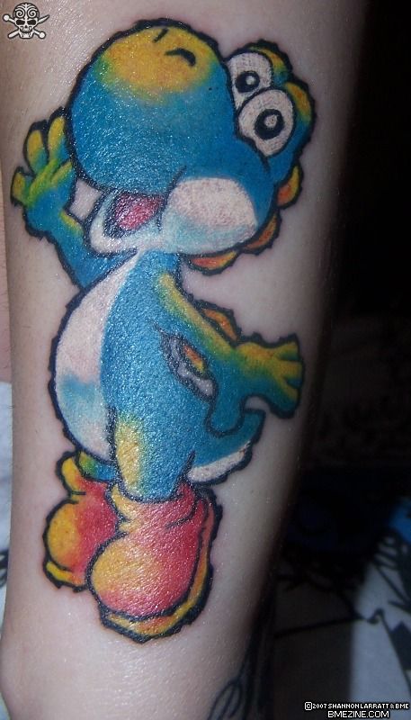 Blue Yoshi tattoo. Yoshi is also immortalized in ink