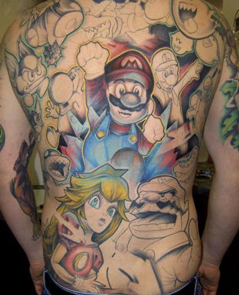 tattos on back. A half finished full back Mario themed tattoo