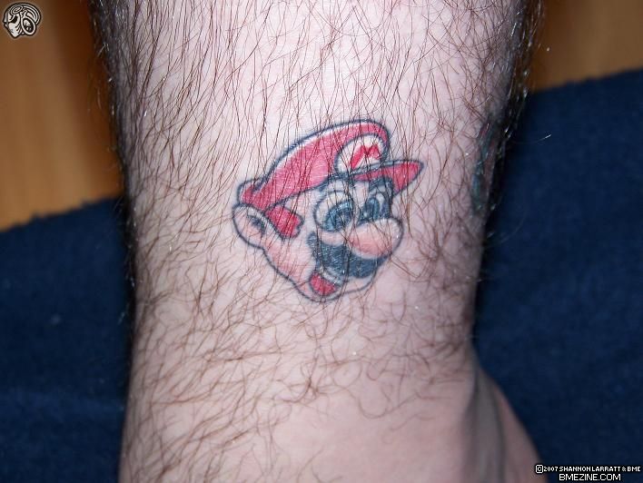 Mario leg tattoo